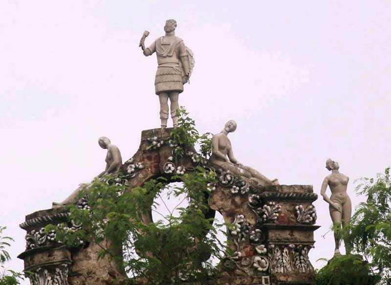 The top of Putul Bari, decorated with statues.