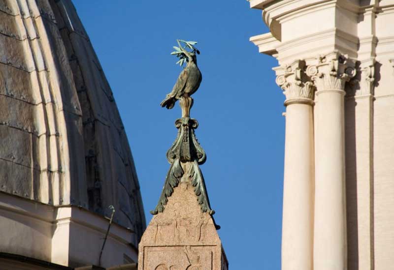 The Dove with an olive twig on the top of the obelisk